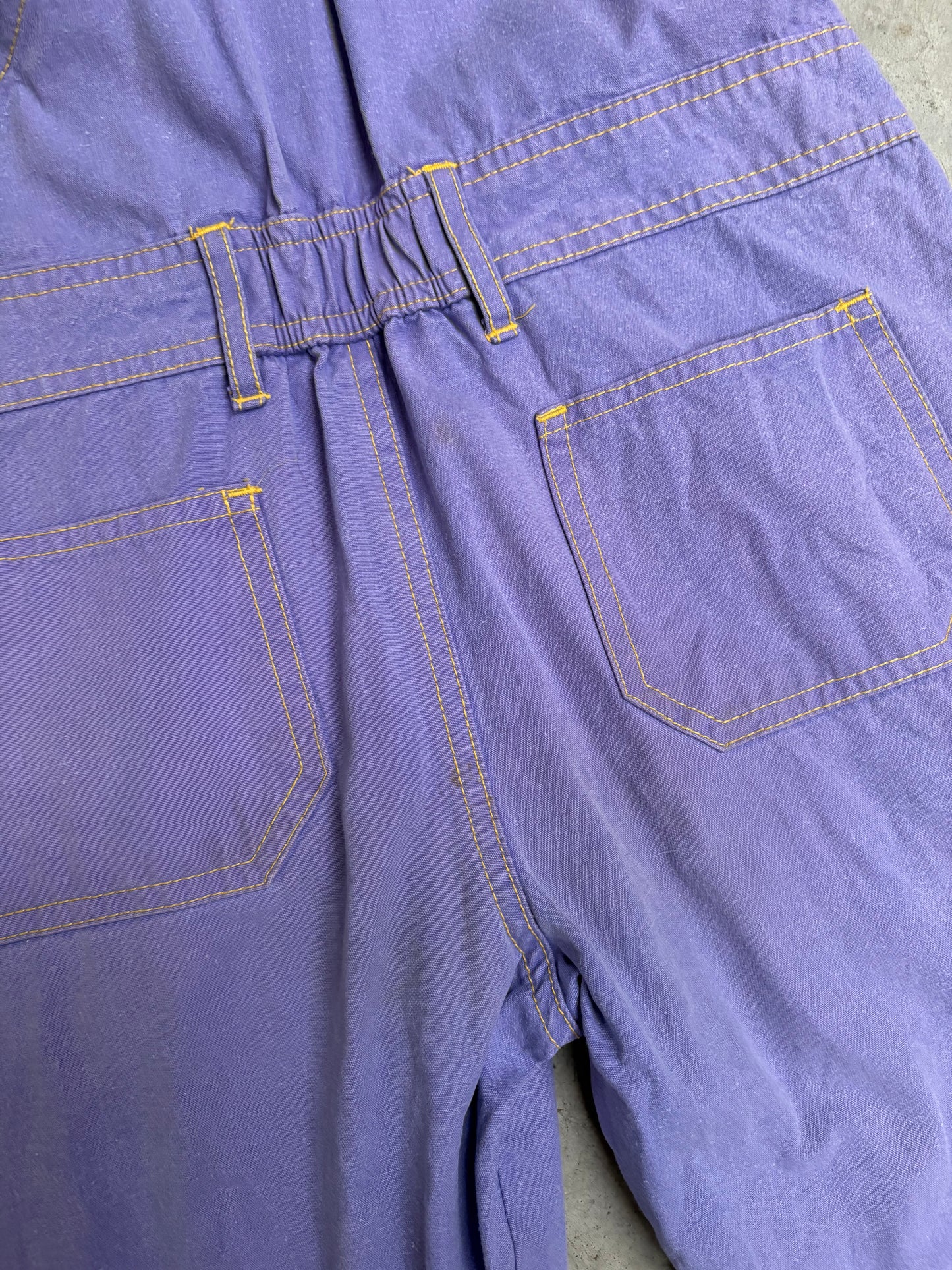 paarse salopette (5/6 jaar)